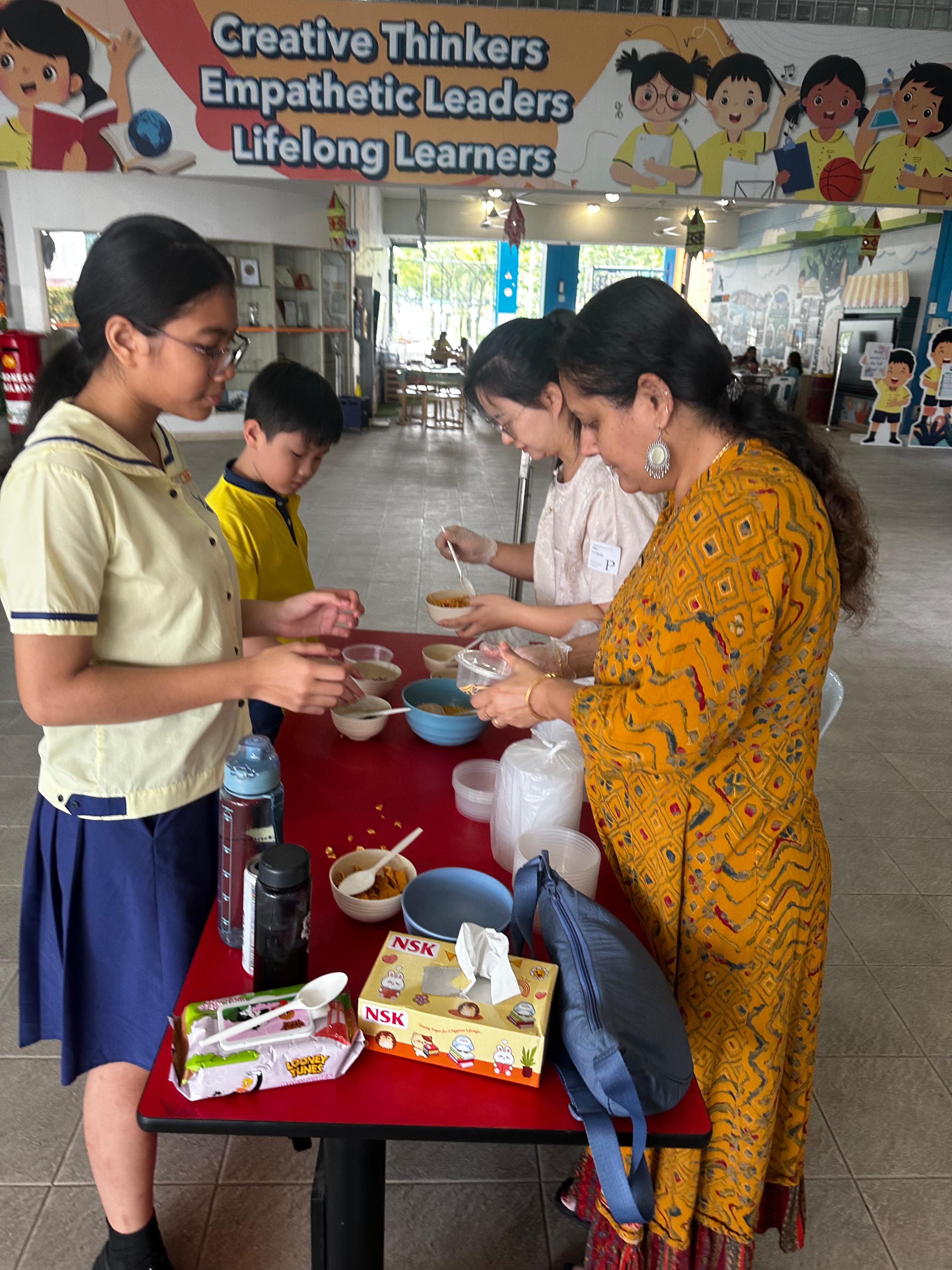 Students having fun at the mixture station